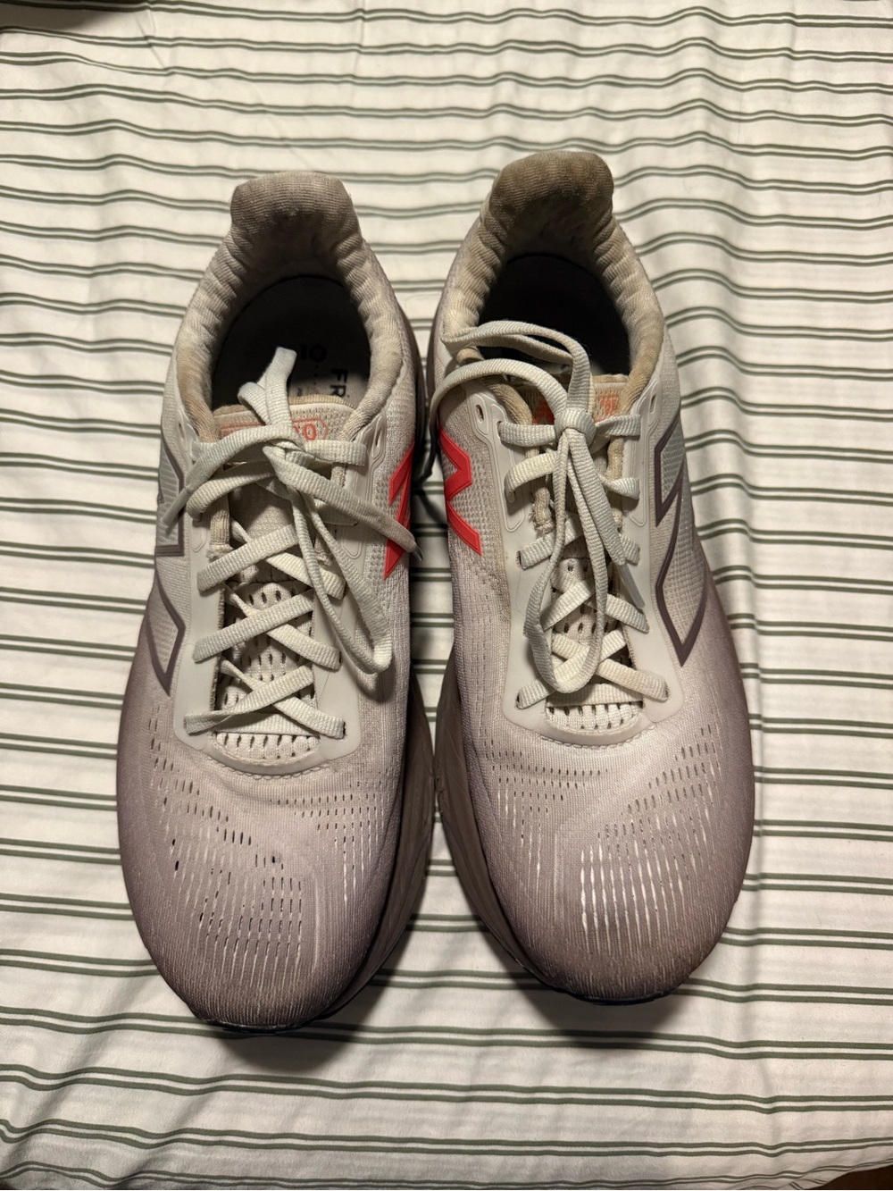 New Balance women’s taupe brown Running Shoes with Coral Accent